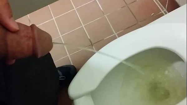 Show Pissing in another public toilet energy Clips
